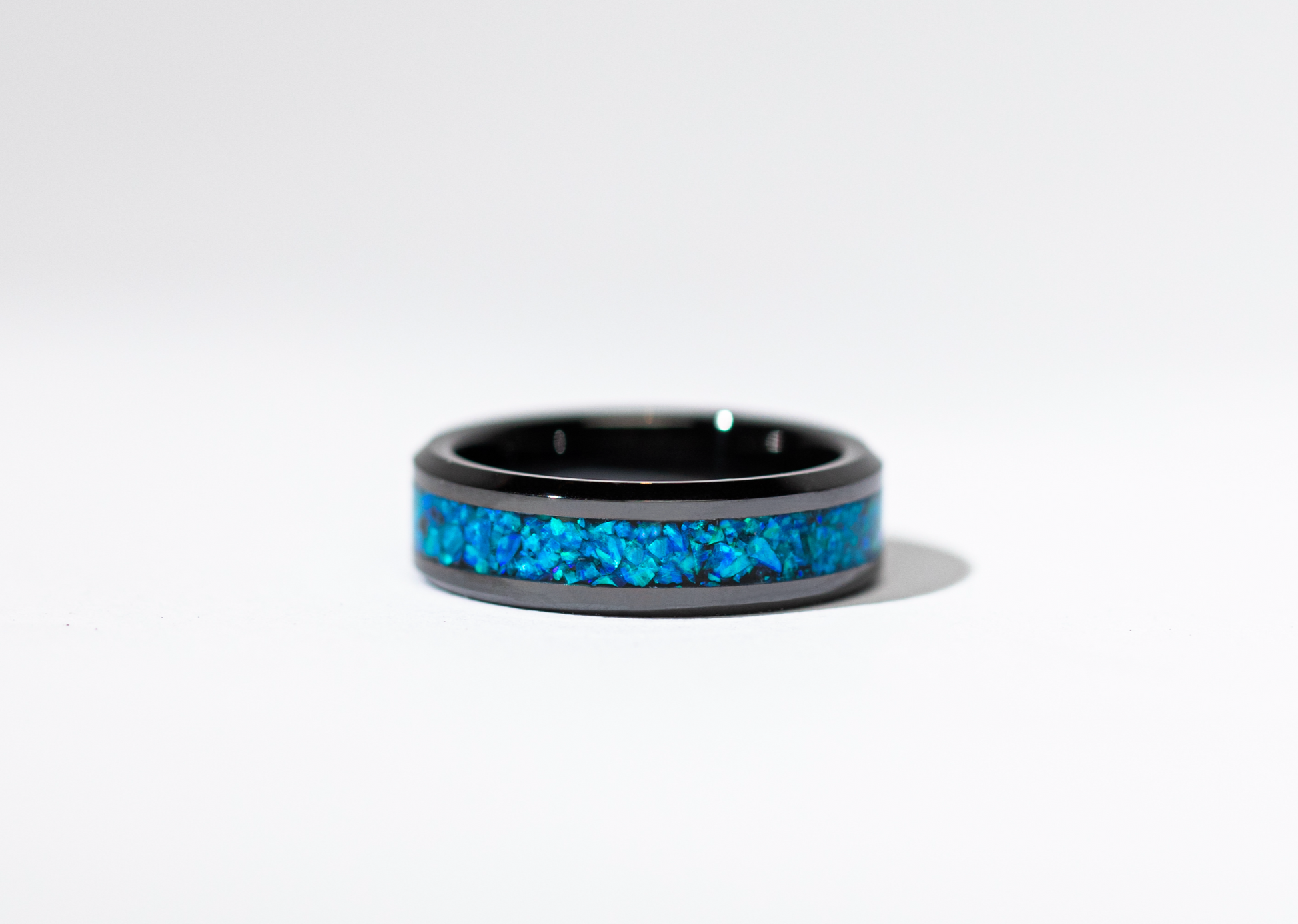Ocean Blue Opal on Black Ceramic Cremation Ring Singapore